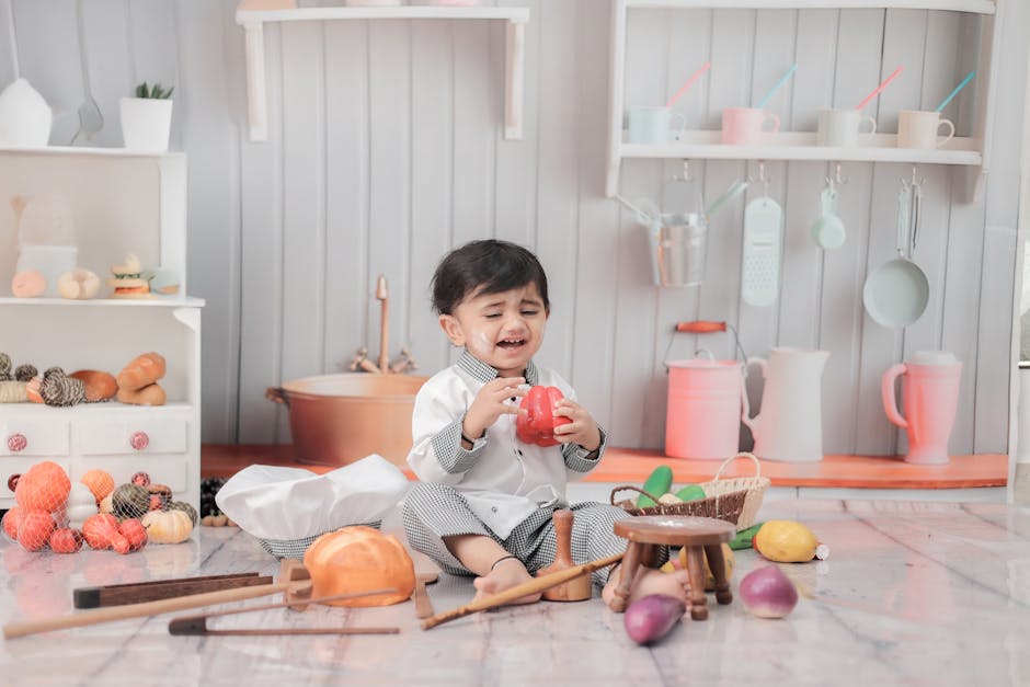 Toddler and parent engaging in a real cooking activity together in a kitchen. width=400>” style=”width:100%;height:auto;border-radius:15px;margin:30px 0;”>

 
  <p>The key to a successful toddler cooking kit experience lies in selecting a kit that is both safe and age-appropriate. When choosing a kit, consider the following:</p>
 
  <ul>
  <li><b>Material Safety:</b> Opt for kits made from non-toxic, BPA-free materials. Avoid kits with small parts or pieces that could pose a choking hazard.</li>
  <li><b>Durability:</b> Toddlers can be notoriously rough with their toys. Choose a kit made from durable materials that can withstand energetic play.</li>
  <li><b>Age Recommendations:</b> Always adhere to the manufacturer’s age recommendations. Kits designed for older children may contain small parts or components that are not suitable for toddlers.</li>
  <li><b>Realistic vs. Cartoonish:</b> Consider your child’s preferences. Some toddlers may enjoy realistic-looking tools and ingredients, while others may prefer brightly colored, cartoonish designs.</li>
  </ul>
 
  <p>Look for kits that include essential cooking tools like pots, pans, spatulas, mixing spoons, and measuring cups. Some kits include play food items like fruits, vegetables, and baked goods. Consider kits with recipe cards or cookbooks designed for toddlers, which can inspire creativity and encourage imaginative play. Fabric chef hats and aprons add to the immersive experience.</p>
 
  <img decoding=