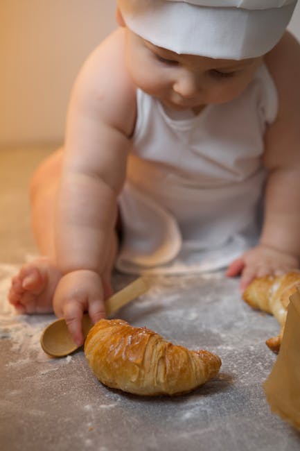 Close-up of various play kitchen utensils, including pots, pans, and wooden spoons. width=400>” style=”width:100%;height:auto;border-radius:15px;margin:30px 0;”>

 
  <p>Toddlers are naturally drawn to mimicking the activities they see adults doing. Cooking is no exception. A chef cooking kit allows them to emulate their parents or caregivers in the kitchen, fostering a sense of independence and accomplishment. These kits transform playtime into a culinary adventure, where they can experiment with ingredients (pretend, of course!) and create their own masterpieces.</p>
 
  <p>The benefits extend far beyond simple entertainment. Chef cooking kits offer a wealth of developmental opportunities:</p>
 
  <ul>
  <li><b>Fine Motor Skills:</b> Manipulating small utensils, stirring imaginary ingredients, and decorating pretend treats all contribute to developing fine motor skills and hand-eye coordination.</li>
  <li><b>Cognitive Development:</b> Following recipe cards (even if they’re just for show), problem-solving when things “go wrong,” and understanding cause and effect are all cognitive exercises that enrich playtime.</li>
  <li><b>Language Development:</b> Naming ingredients, describing cooking processes, and engaging in pretend conversations with their “customers” expands vocabulary and communication skills.</li>
  <li><b>Social-Emotional Development:</b> Sharing pretend food with siblings or friends encourages cooperation and social interaction. Taking on the role of a chef builds confidence and self-esteem.</li>
  </ul>
 
  <img decoding=