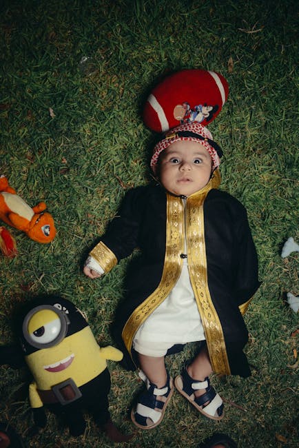 A toddler interacting with the Sozzy 2026 baby doll.